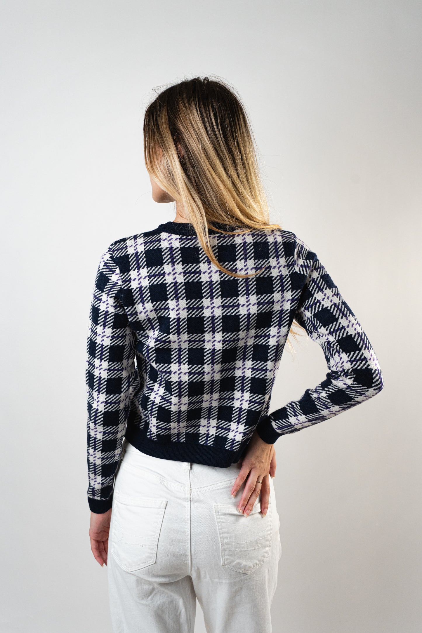 Back view of the Blair Knit Cardigan in navy checkered knit pattern.