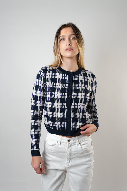 Model wearing the Blair Knit Cardigan in navy checkered pattern.