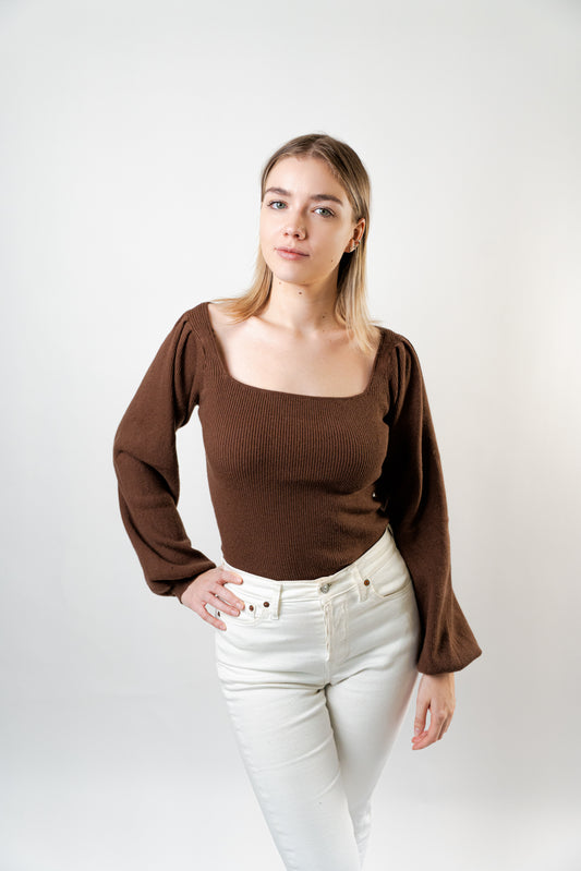 Model wearing the Elise Square Knit Top in brown, featuring a square neckline and ribbed knit texture.