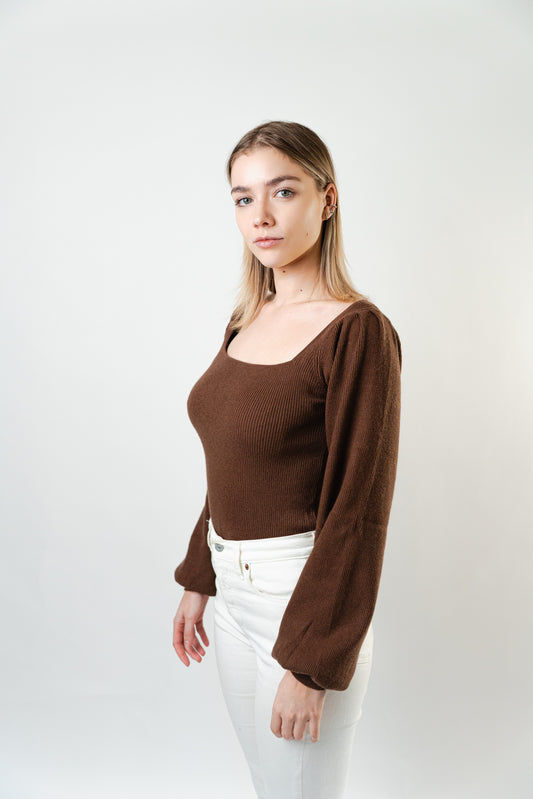 Side view of the Elise Square Knit Top in brown, showing the square neckline, ribbed knit texture, and long sleeves.